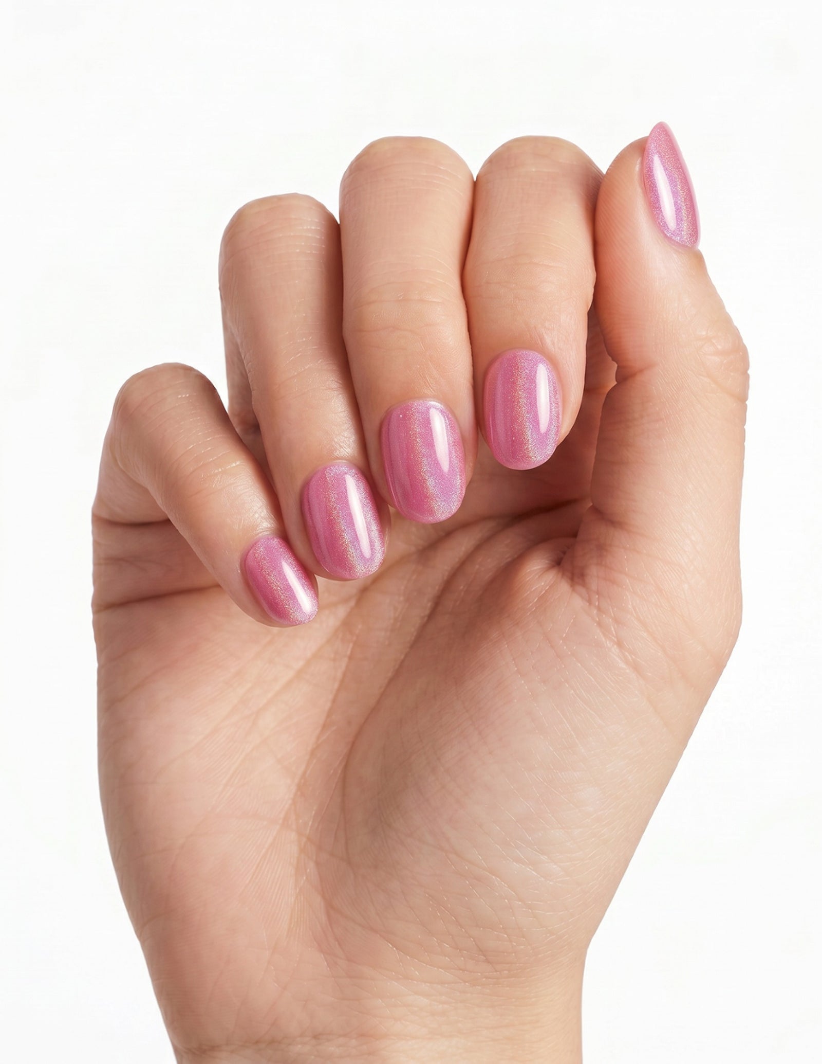 Pink Velvet press-on nails — Oval (extra-short), light-skin hand, fingers curled