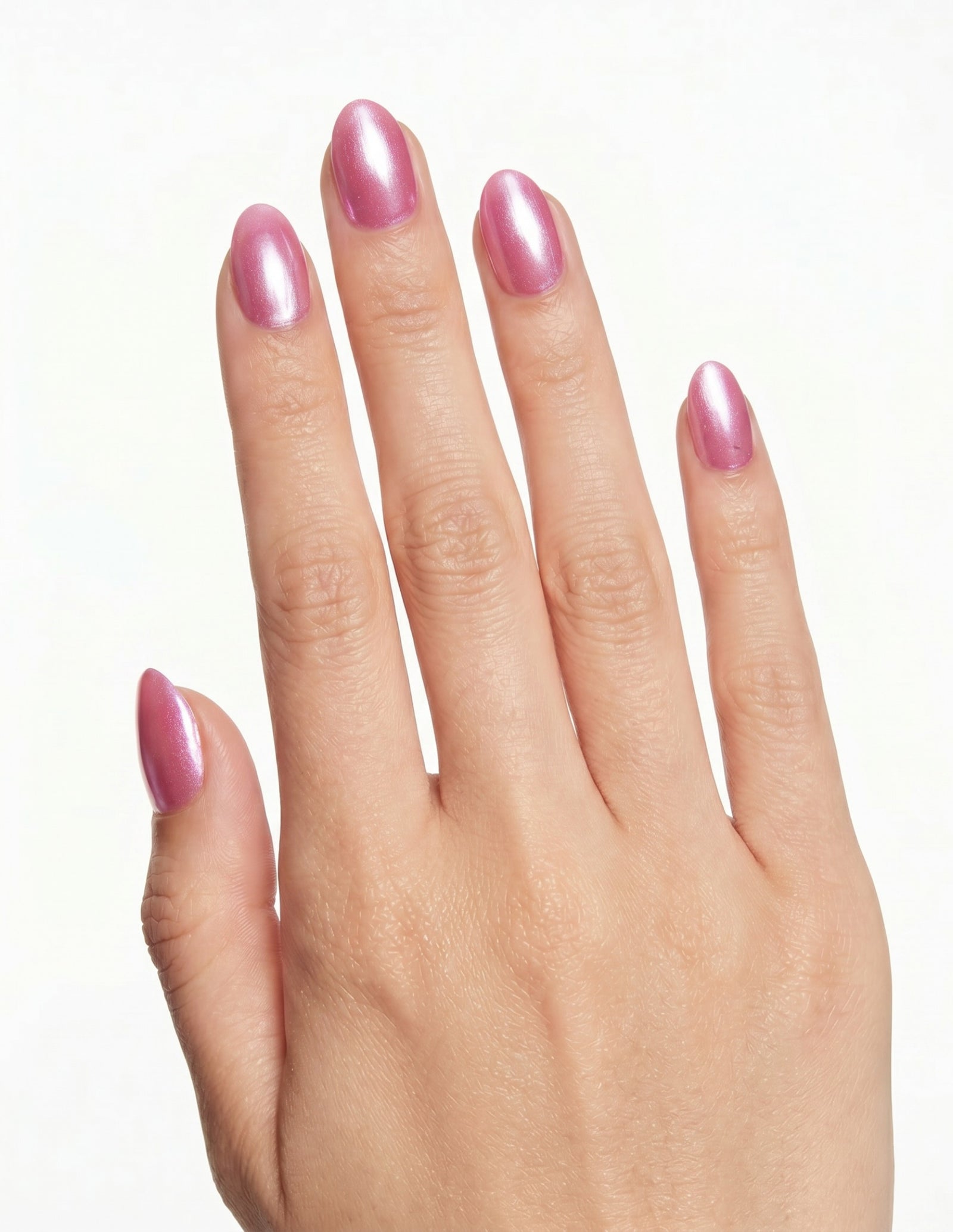 Raspberry Velvet press-on nails — Almond (extra-short), light-skin hand, back of hand