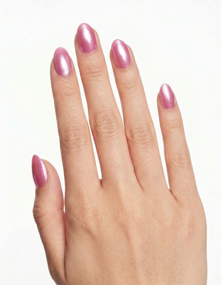 Raspberry Velvet press-on nails — Almond (extra-short), light-skin hand, back of hand