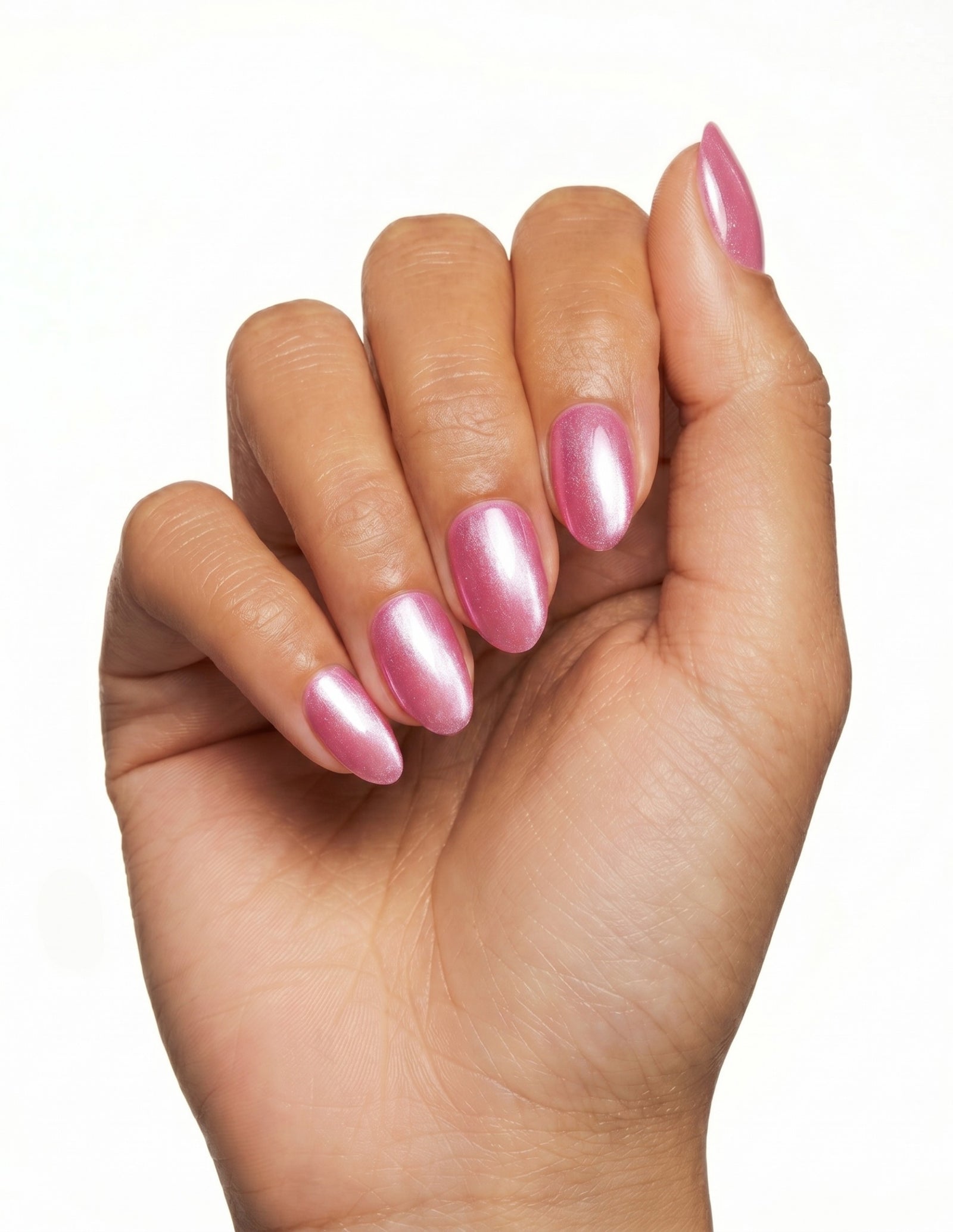 Raspberry Velvet press-on nails — Almond (extra-short), tan hand, fingers curled