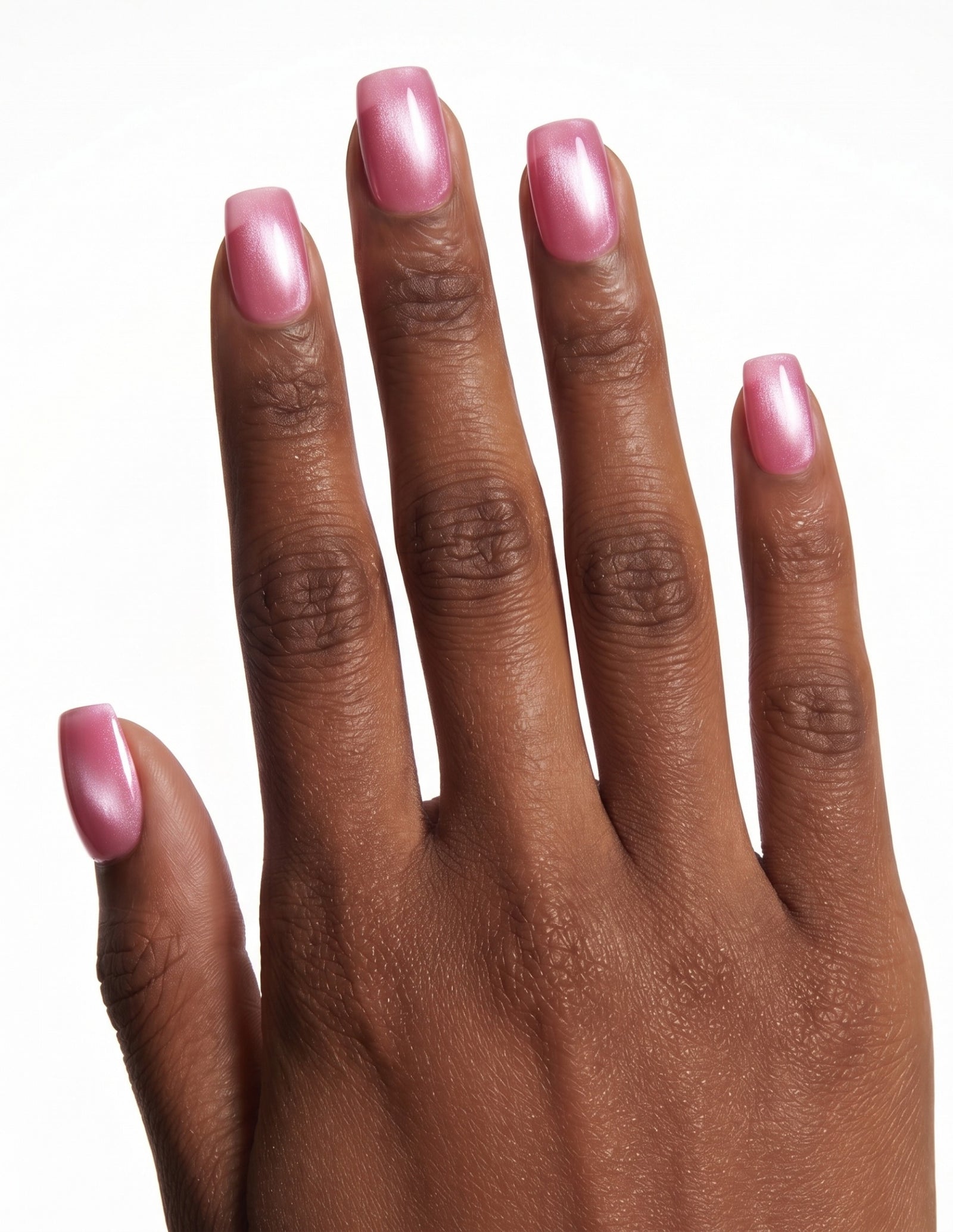 Raspberry Velvet press-on nails — Coffin (short), deep-skin hand, back of hand