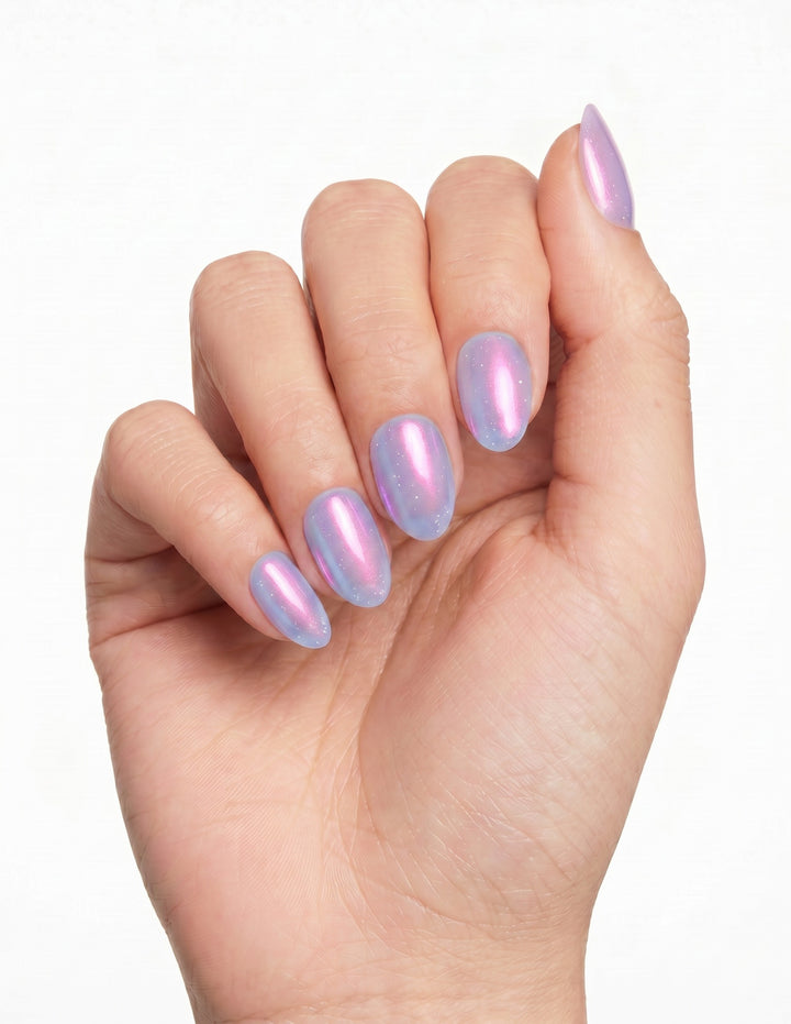 Lilac Chrome press-on nails — Almond (extra-short), deep-skin hand, fingers curled