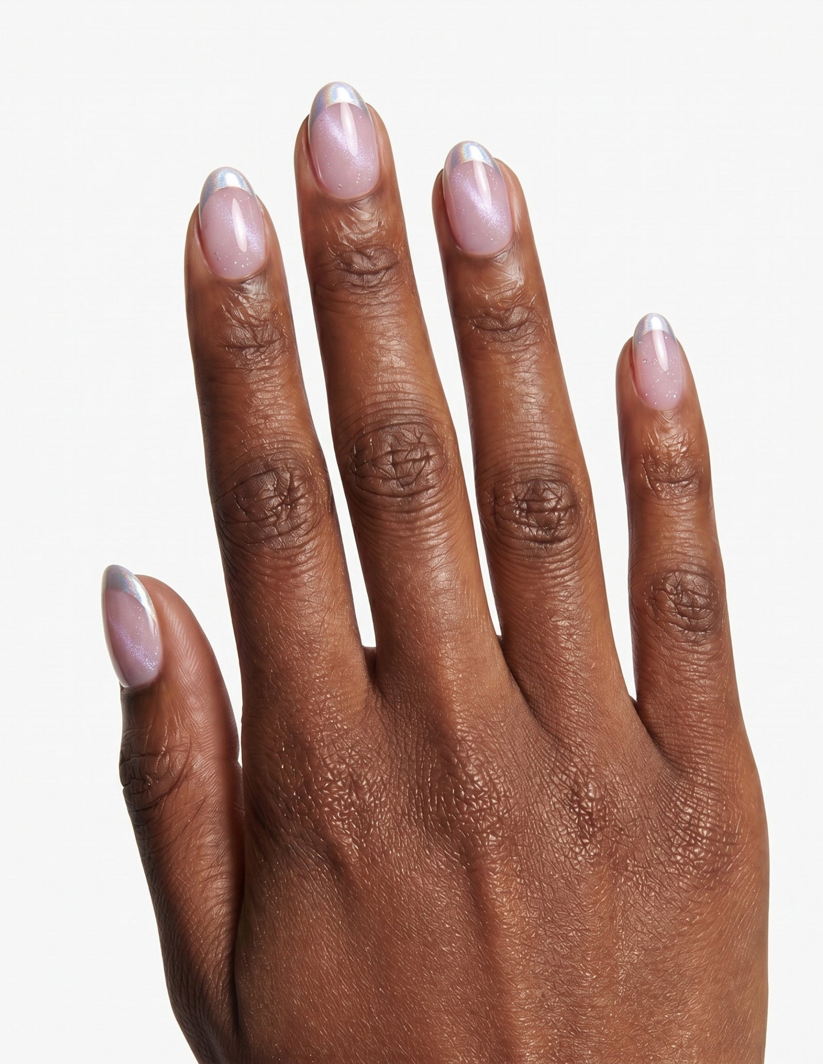 Sugar Tips press-on nails — Almond (extra-short), deep-skin hand, back of hand