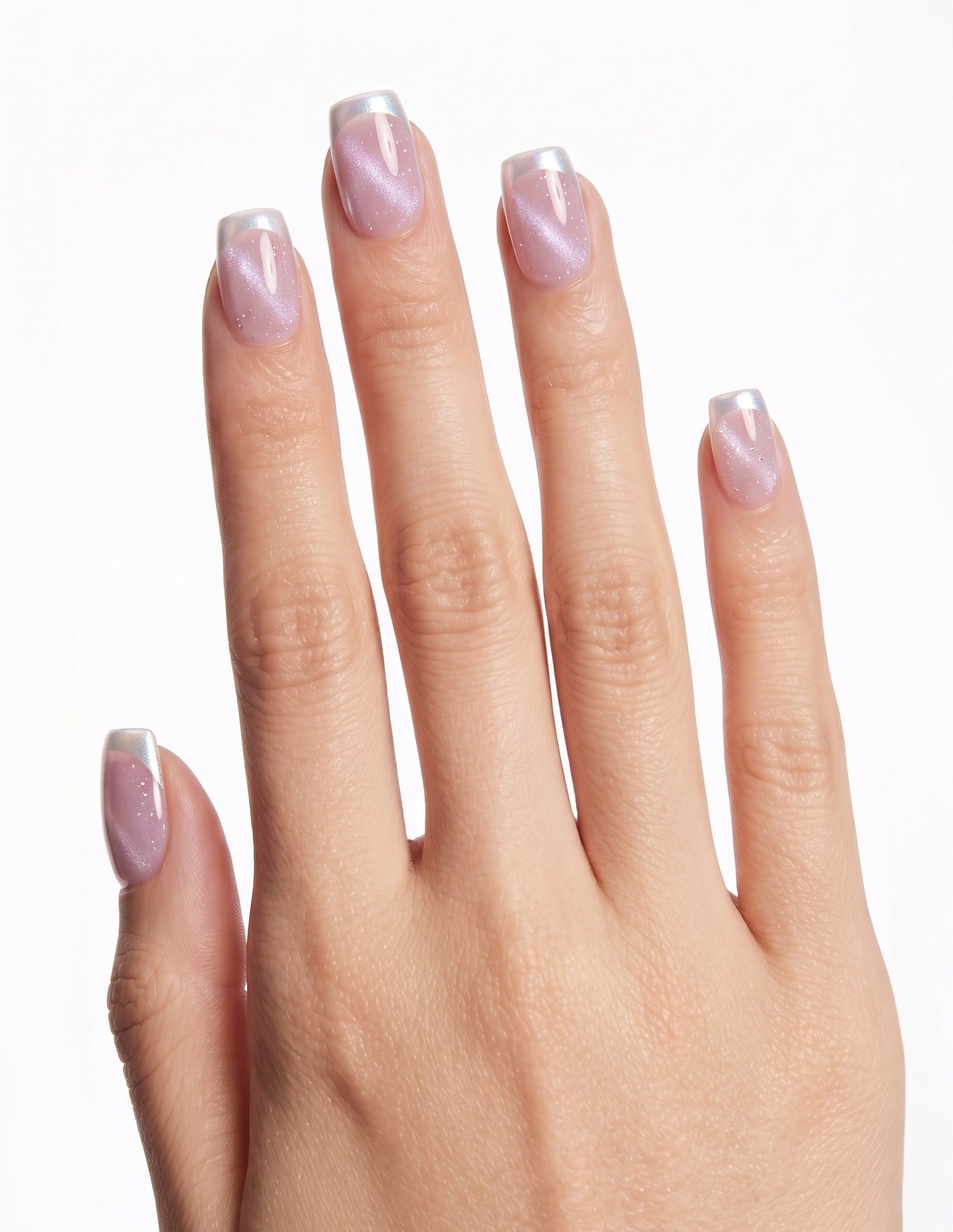 Sugar Tips press-on nails — Coffin (short), light-skin hand, back of hand