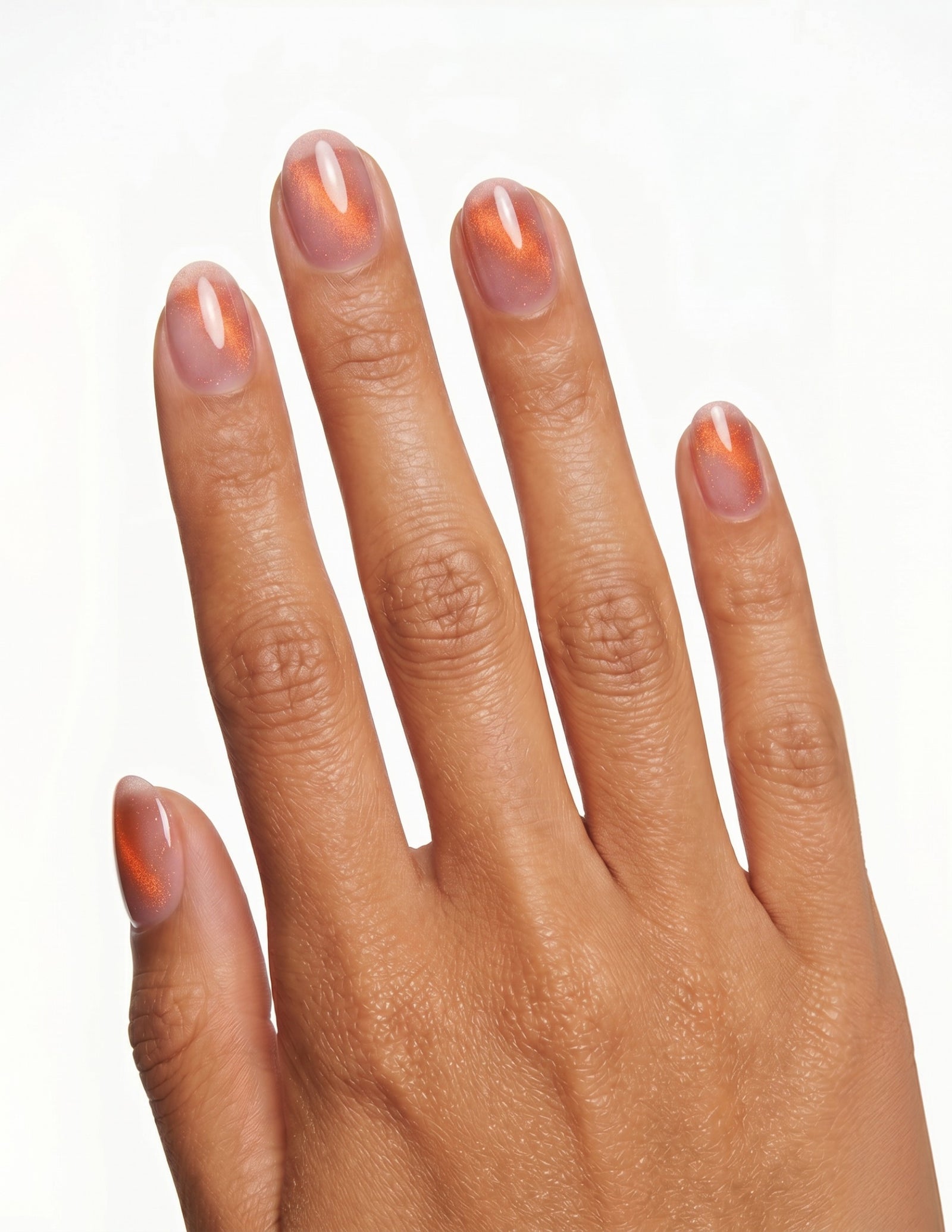 Spritz press-on nails — Oval (extra-short), tan hand, back of hand