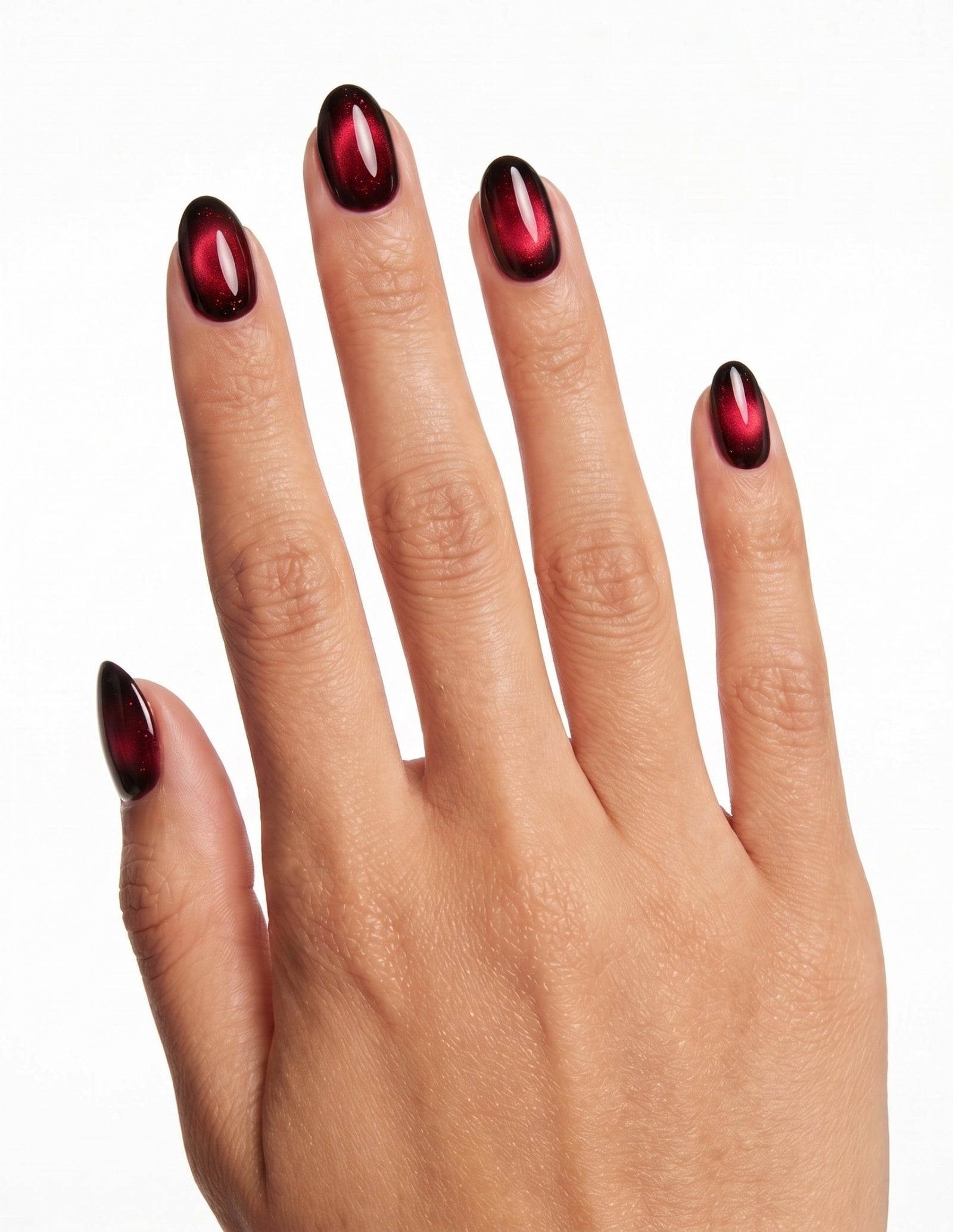 Cherry Noir press-on nails — Almond (extra-short), light-skin hand, back of hand