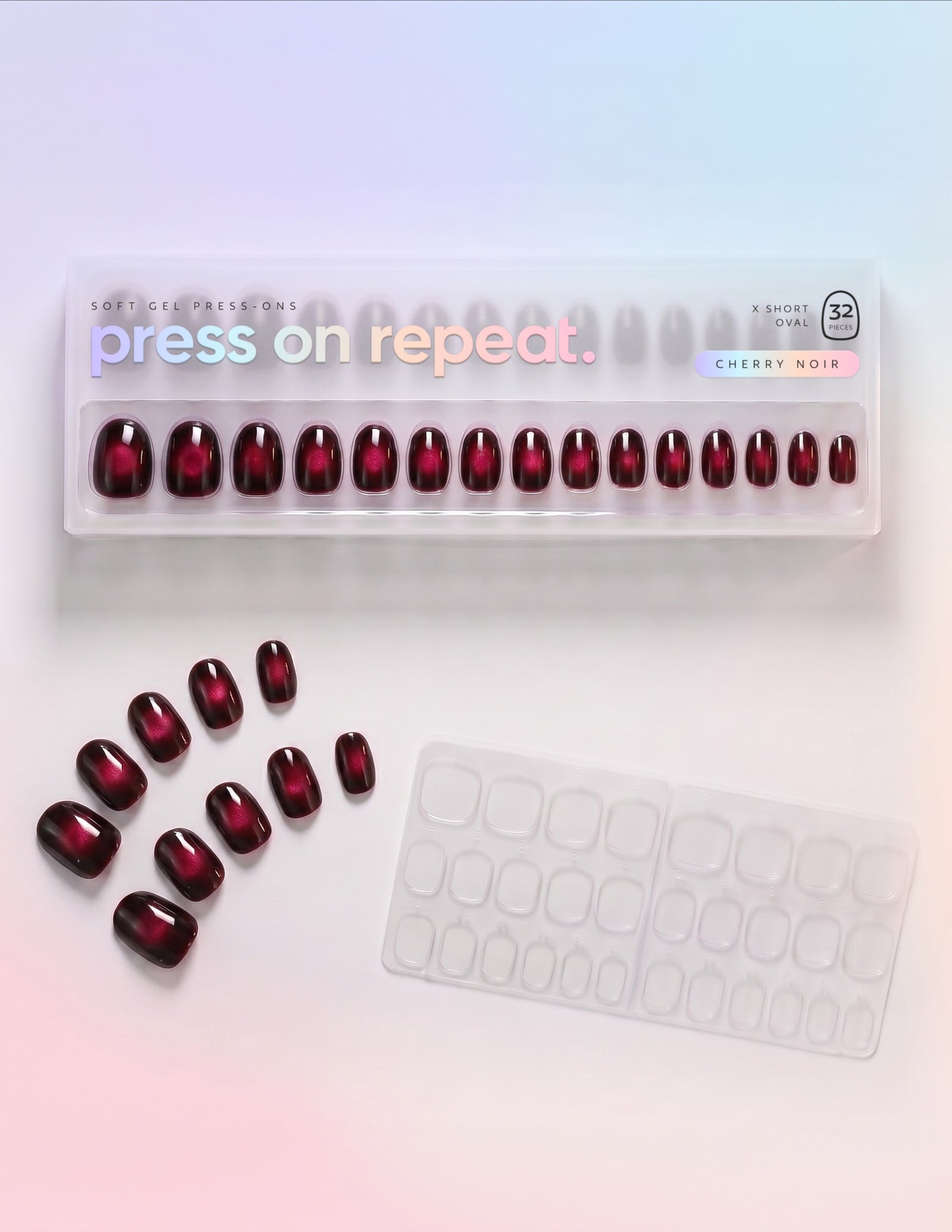 Cherry Noir press-on nails — Oval (extra-short) retail box with loose nails and adhesive tabs