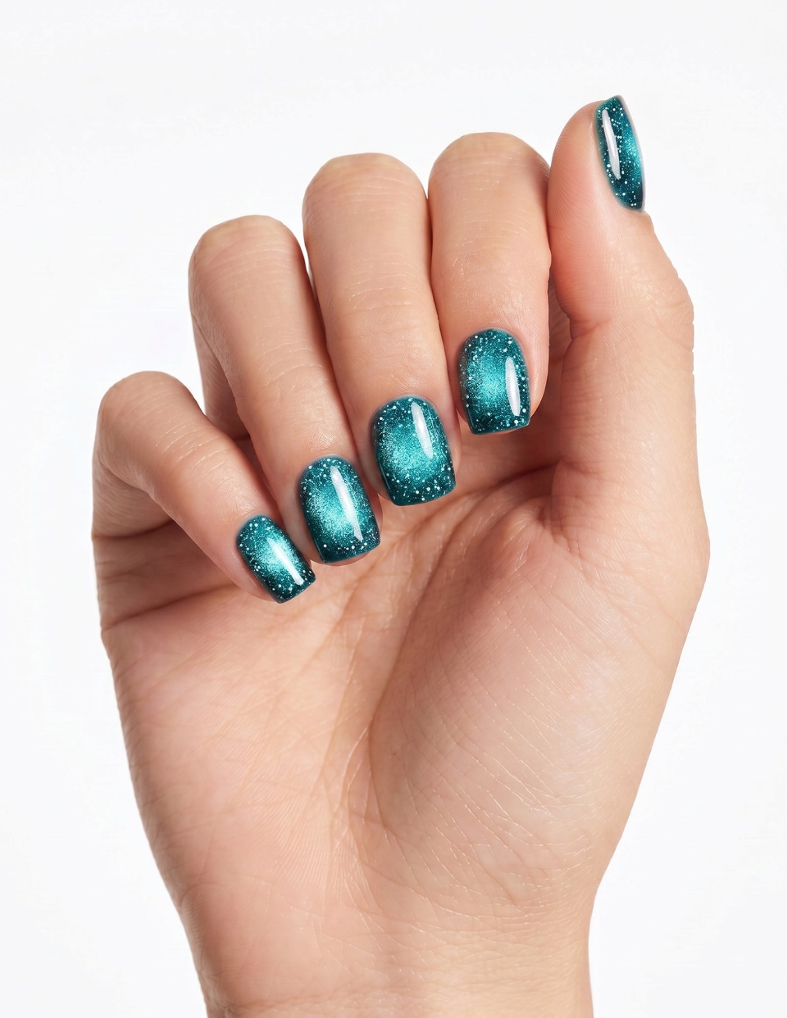 Lagoon press-on nails — Coffin (short), light-skin hand, fingers curled