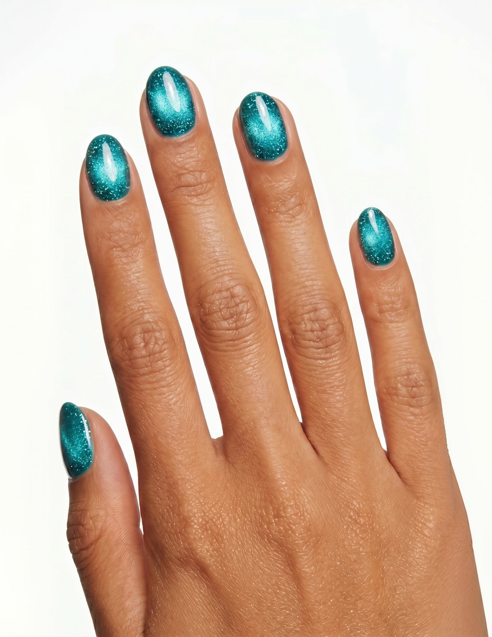 Lagoon press-on nails — Oval (extra-short), tan hand, back of hand
