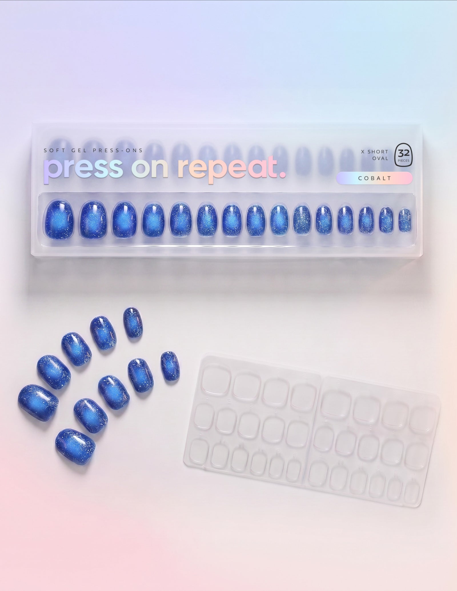 Cobalt press-on nails — Oval (extra-short) retail box with loose nails and adhesive tabs