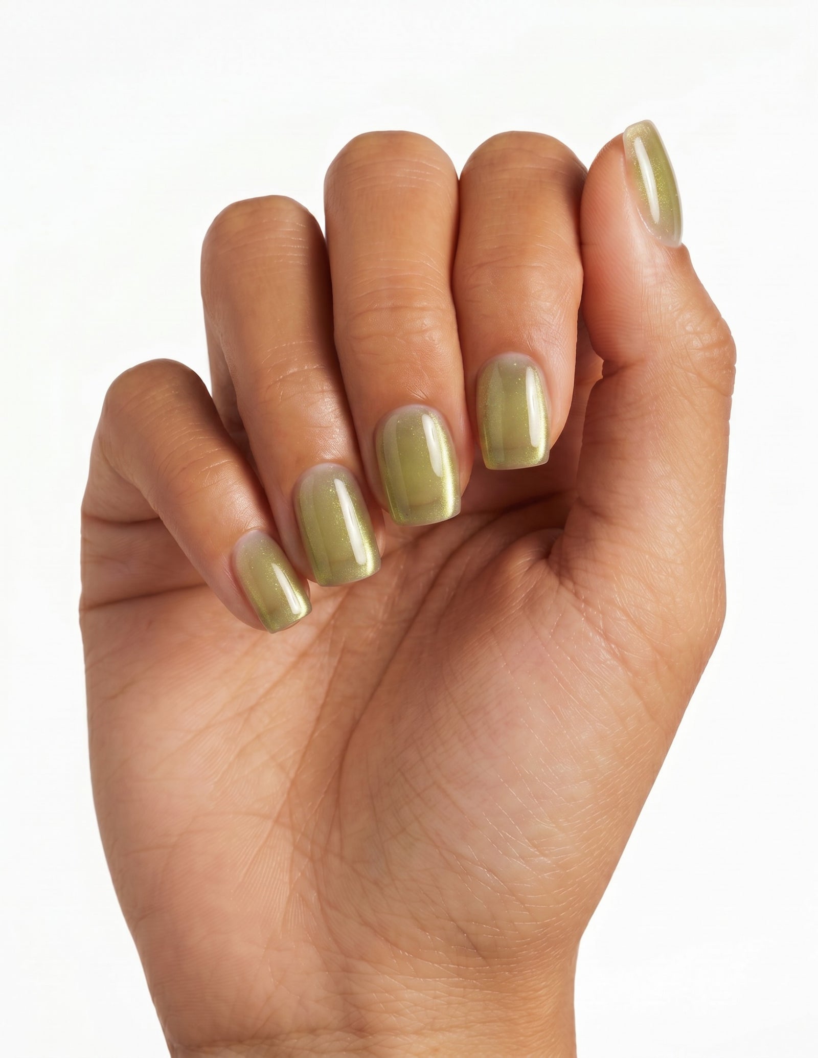 Olive Velvet press-on nails — Coffin (short), tan hand, fingers curled