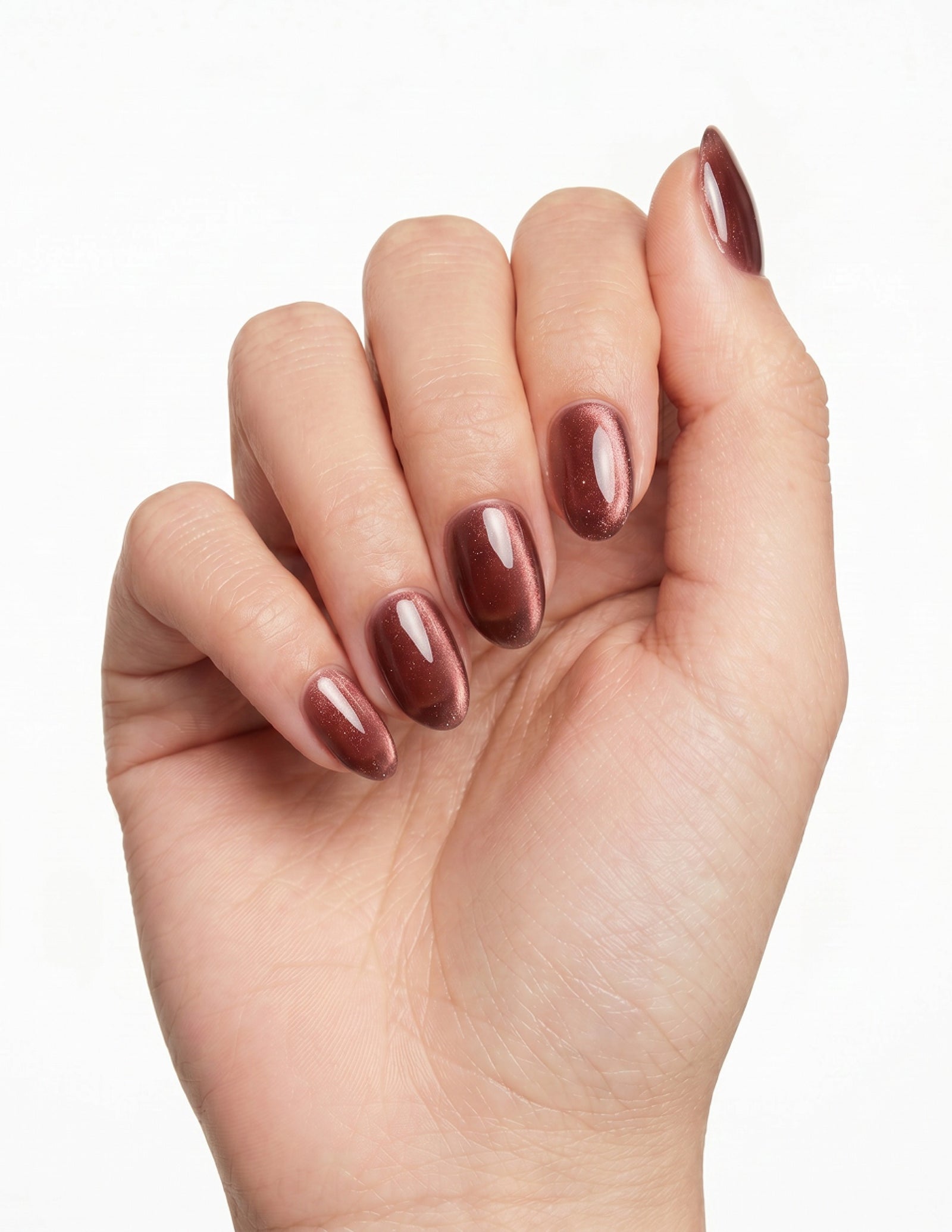 Espresso Velvet press-on nails — Almond (extra-short), light-skin hand, fingers curled