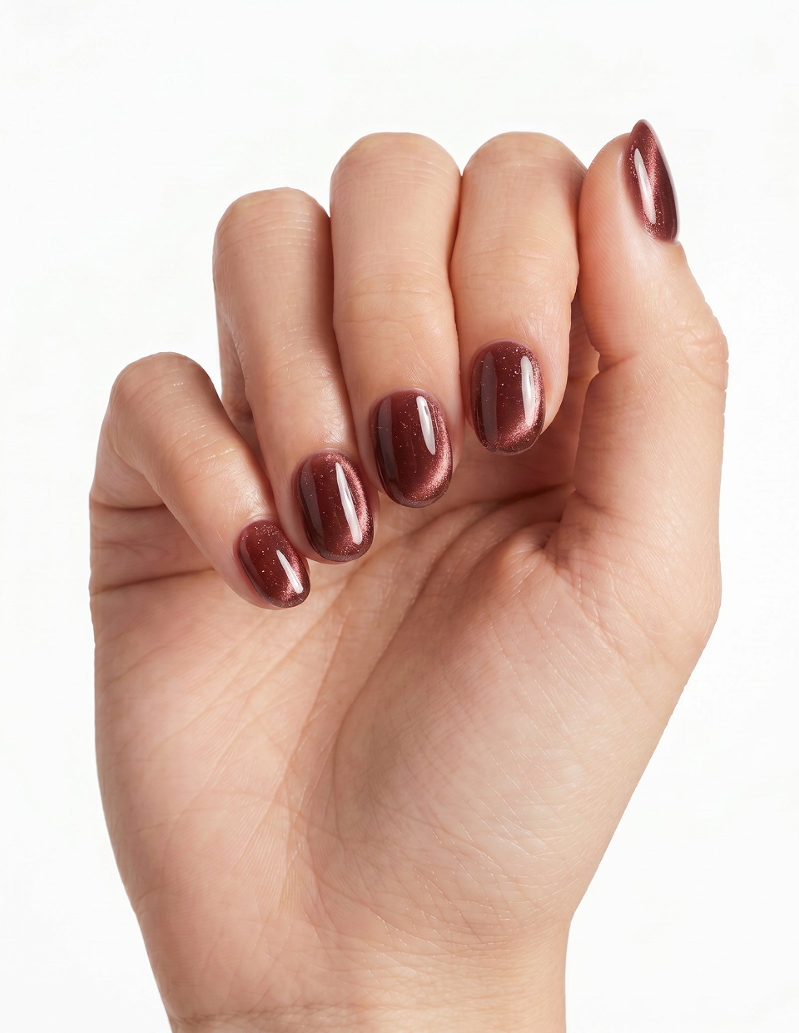Espresso Velvet press-on nails — Oval (extra-short), light-skin hand, fingers curled