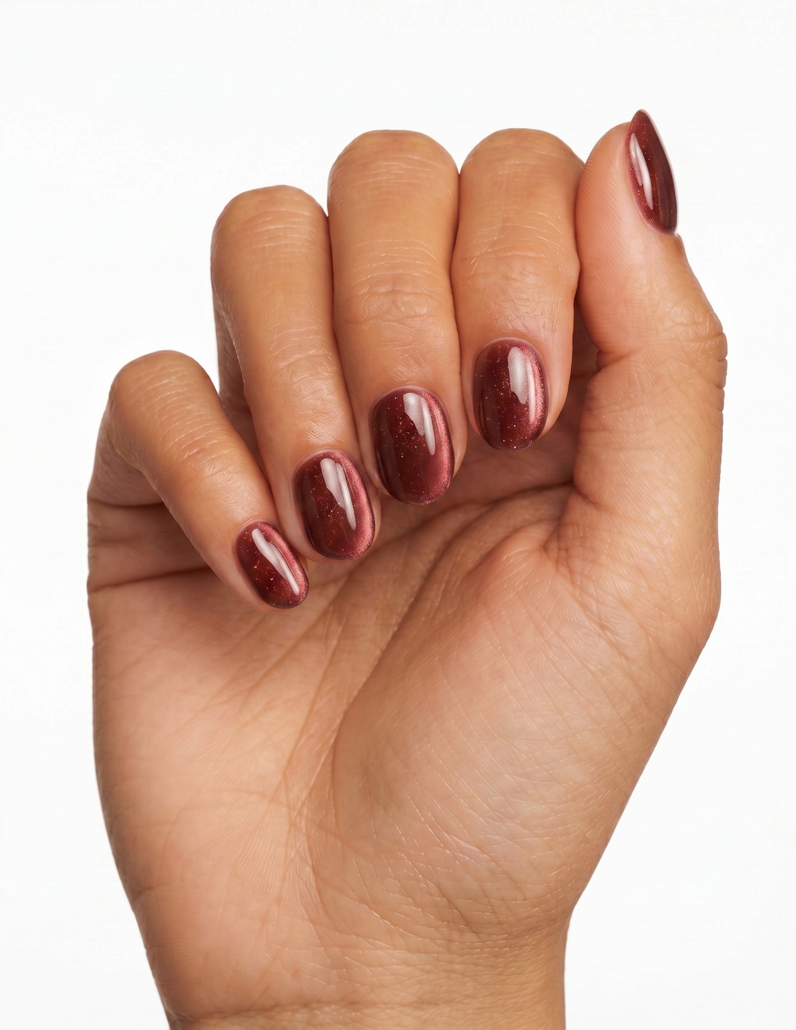 Espresso Velvet press-on nails — Oval (extra-short), deep-skin hand, fingers curled