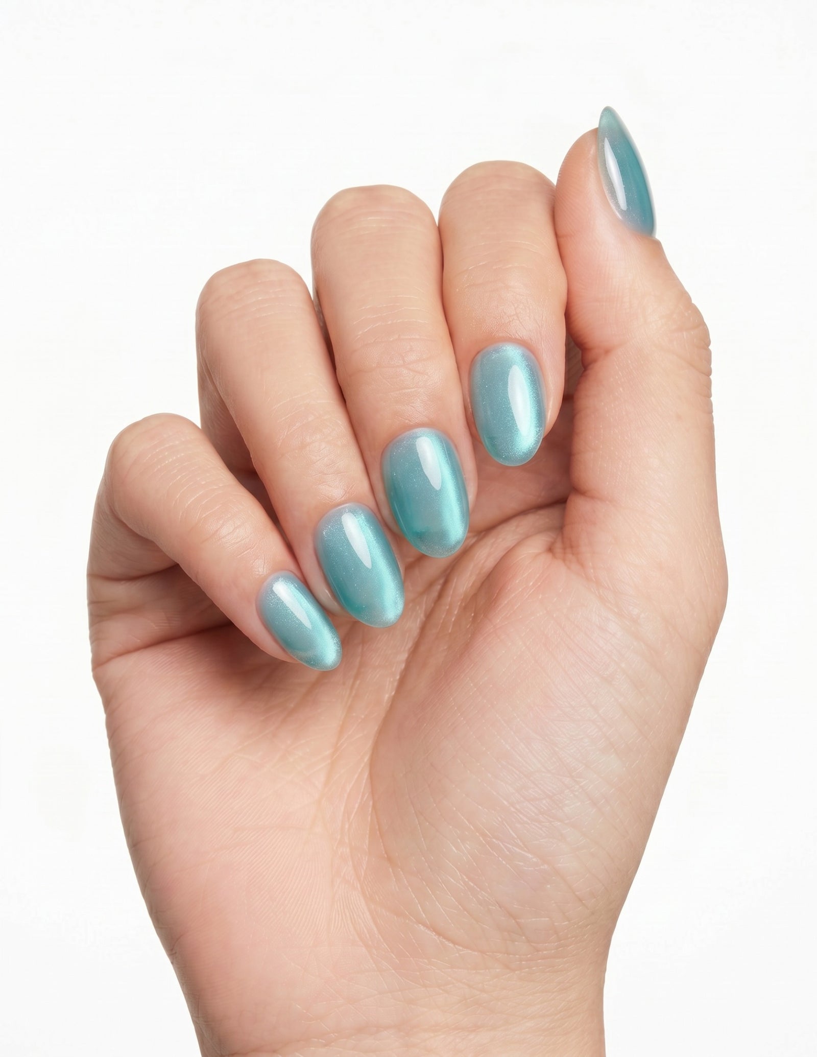 Aurora Lagoon press-on nails — Almond (extra-short), light-skin hand, fingers curled