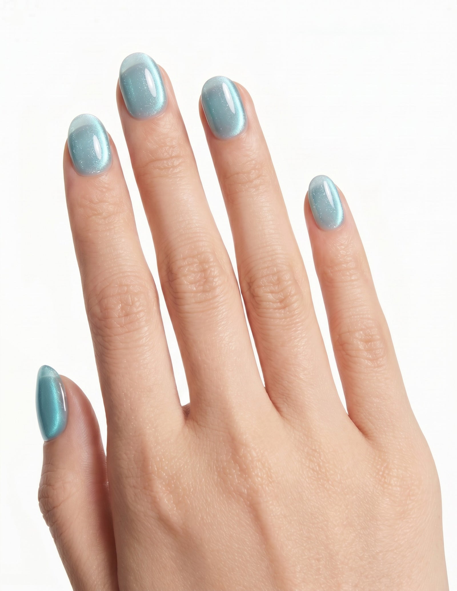 Aurora Lagoon press-on nails — Oval (extra-short), light-skin hand, back of hand
