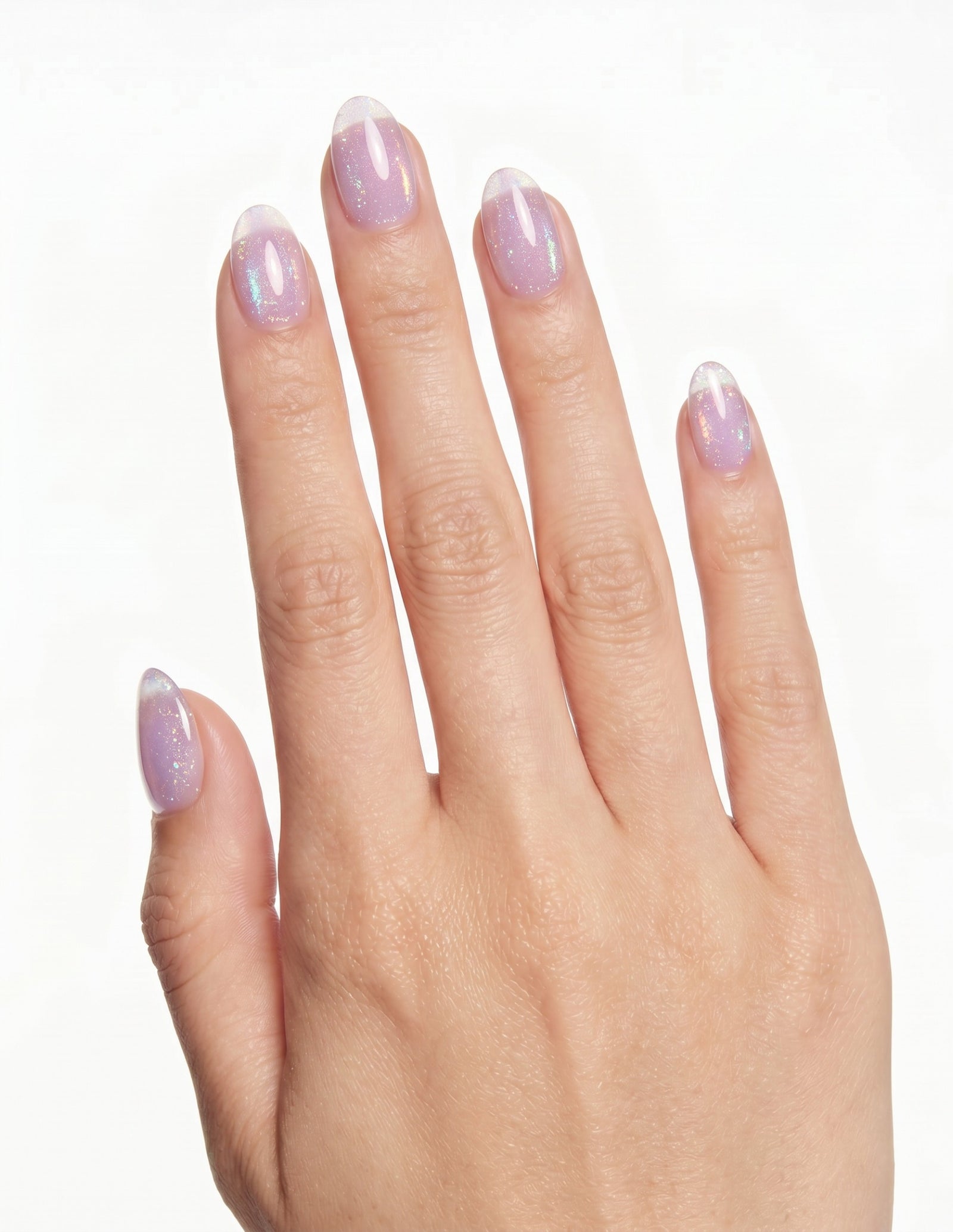 Aurora Lilac press-on nails — Almond (extra-short), light-skin hand, back of hand