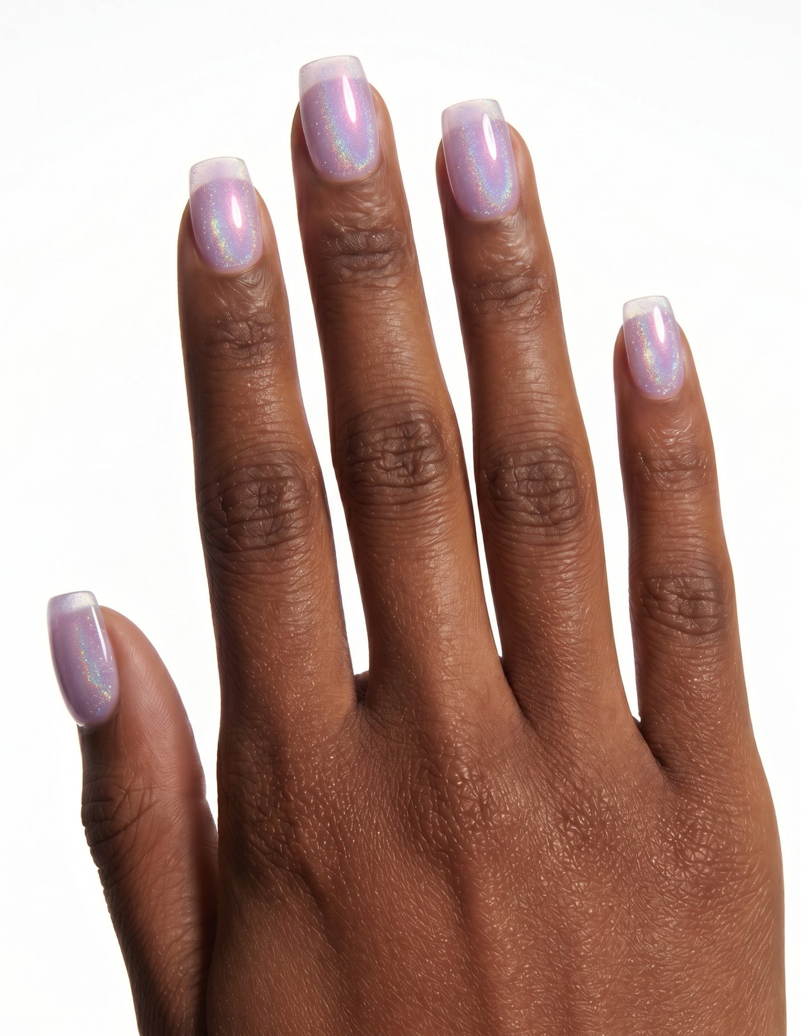 Aurora Lilac press-on nails — Coffin (short), deep-skin hand, back of hand